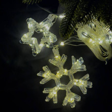 Світлодіодна гірлянда-завіса прозорий дріт Зірки та сніжинки 10 LED 3 х 0.9 м жовтий (RZN-23104450)
